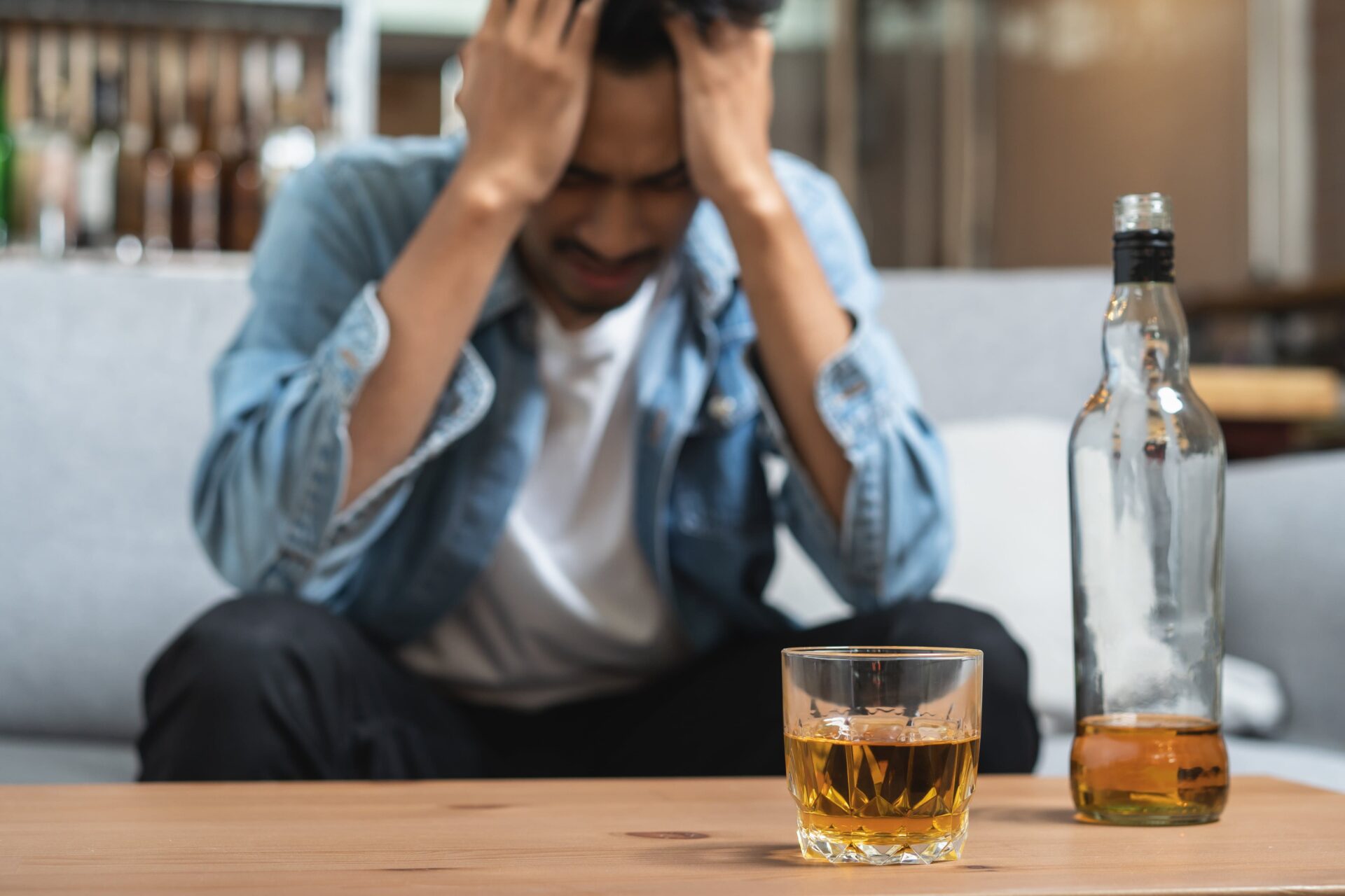 man with an alcohol addiction needs help from a loved one