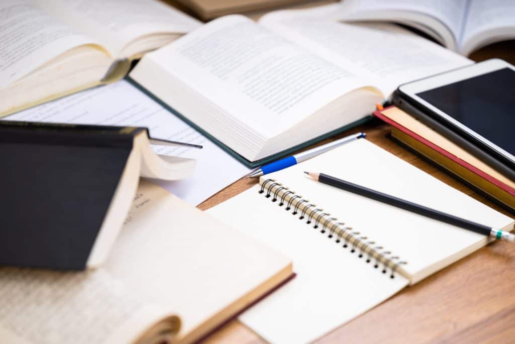 books with a phone as well as pen and paper
