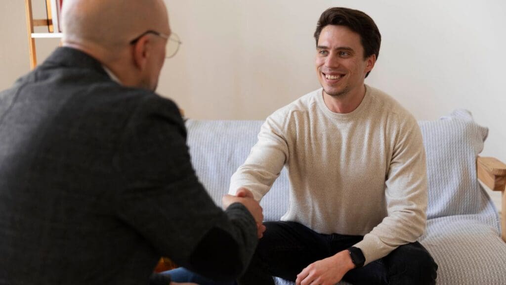 A man greeting his therapist at Tulip Hill's Smyrna rehab.