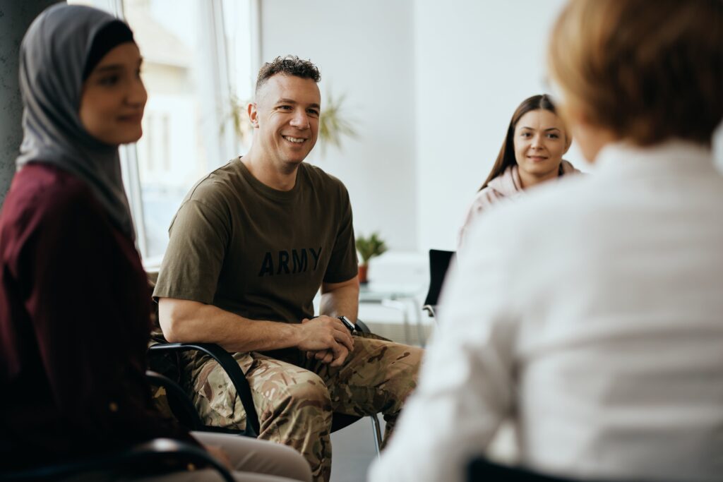 veteran sits in with a support group during rehab in Smyrna, TN