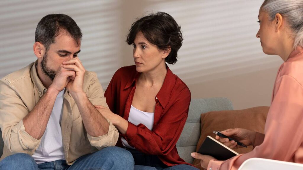 A man with signs of addiction seeking help from an addiction counselor. 