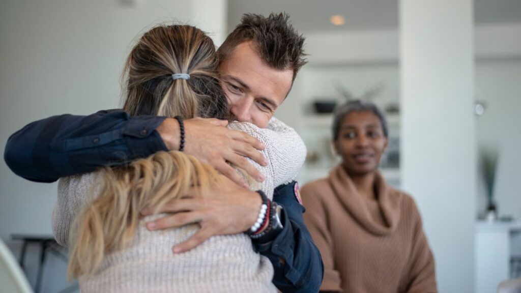 A man hugging a family member during a therapy session at rehab in Murfreesboro, TN.





