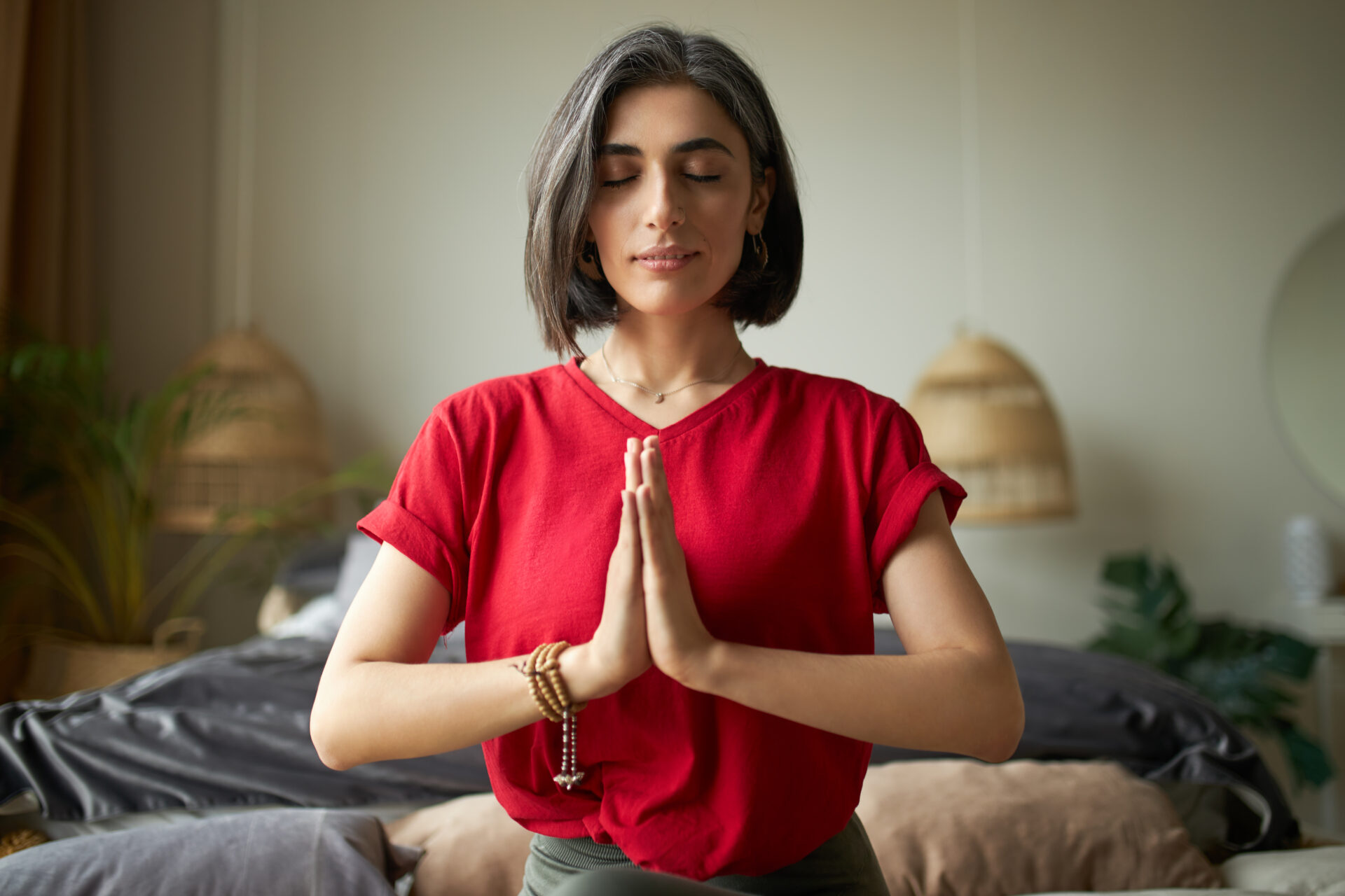 Woman practicing mindfulness and meditation as part of holistic addiction treatment