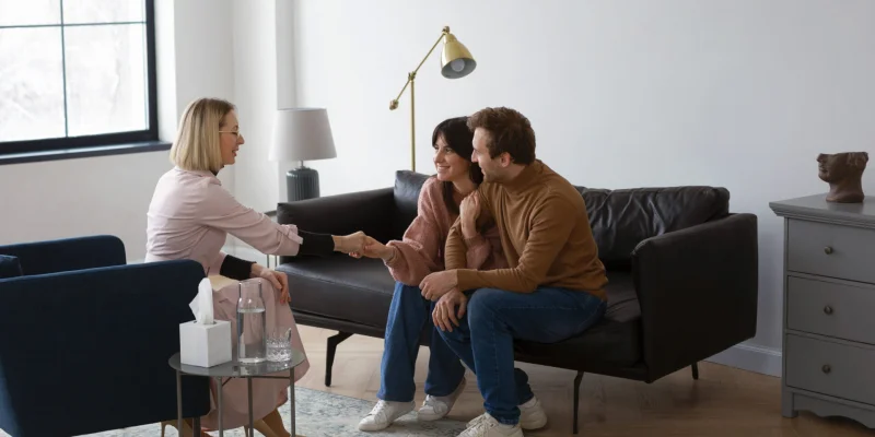 Couple participating in family therapy for addiction recovery